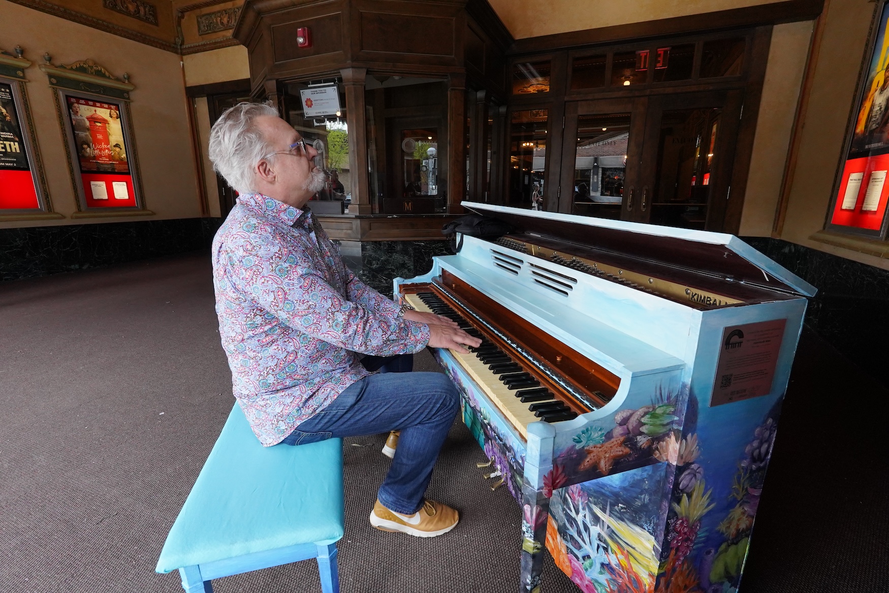 Mr. B, a local boogie-woogie piano legend, plays the Community Keys piano at the Michigan Theater.